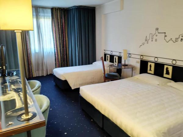 Hotel Giò Wine e Jazz Area : photo 2 de la chambre chambre triple supérieure