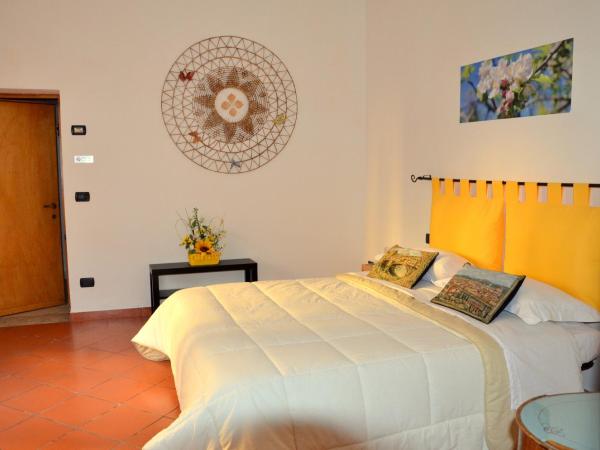 L'Acchiappasogni : photo 3 de la chambre chambre double ou lits jumeaux supérieure - vue sur jardin