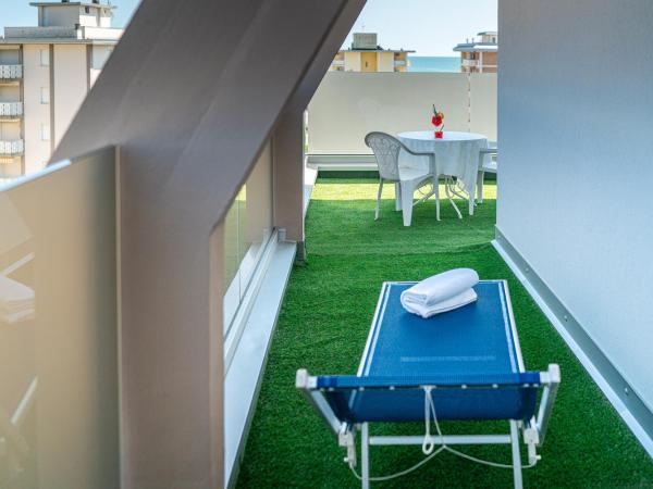 Hotel Alexander : photo 7 de la chambre chambre familiale - vue sur mer