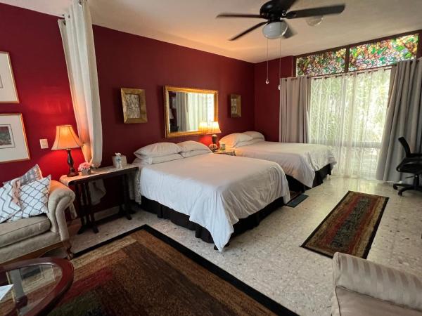 Dickinson Guest House, Guadalajara Expo : photo 2 de la chambre chambre deluxe avec 2 lits queen-size