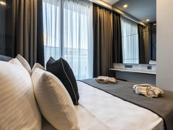 Lucky Monkey Hotel : photo 9 de la chambre chambre double deluxe - vue latérale sur mer