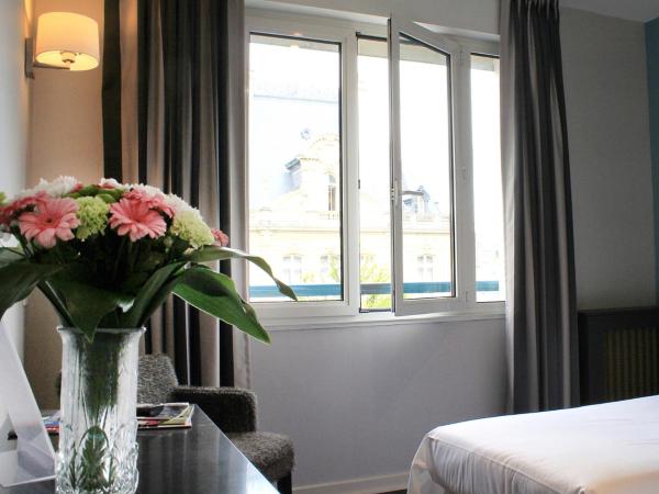 Hotel-Restaurant Le Victoria : photo 10 de la chambre chambre familiale