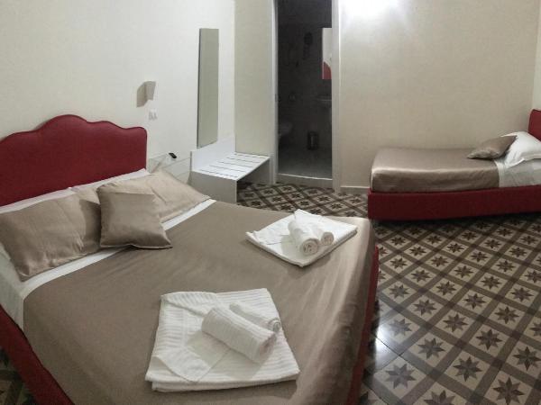 Pietre e Sassi : photo 2 de la chambre chambre triple avec salle de bains privative