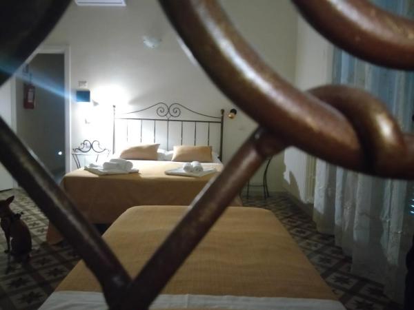 Pietre e Sassi : photo 5 de la chambre chambre quadruple avec salle de bains privative