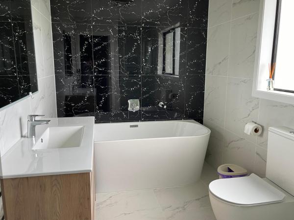 Flat Bush Private Ensuite : photo 4 de la chambre chambre double avec salle de bains privative