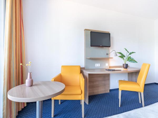 acora Düsseldorf Living the City : photo 2 de la chambre chambre double ou lits jumeaux