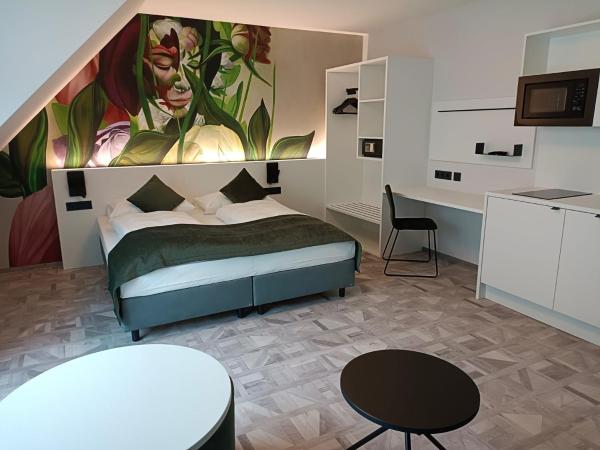 ART-INN Design Self-Check-in-Hotel : photo 10 de la chambre studio lit king-size avec canapé-lit