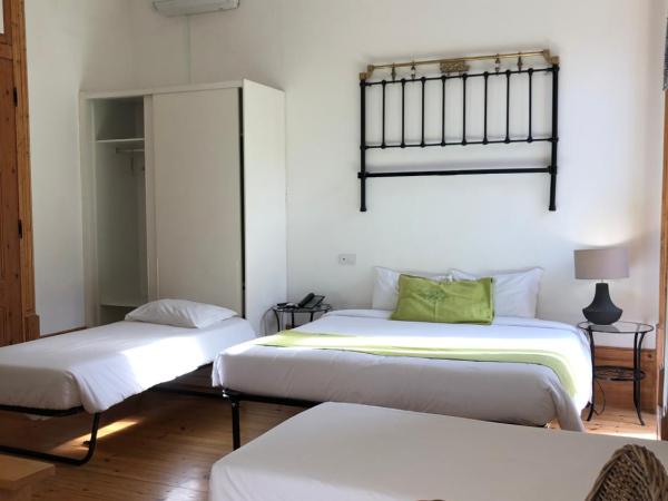 Casa da Praça Square Suites : photo 5 de la chambre appartement supérieur avec balcon