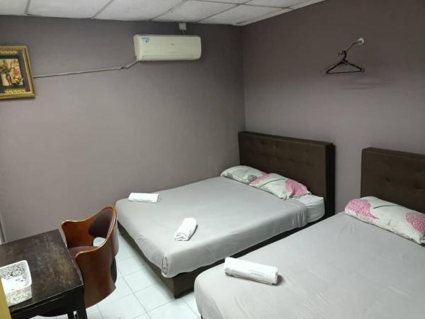 Hotel Tropicanna Pulai Point : photo 3 de la chambre chambre familiale