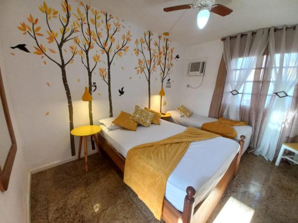 Pousada Costa Del Sol : photo 3 de la chambre chambre triple avec balcon