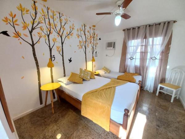 Pousada Costa Del Sol : photo 4 de la chambre chambre triple avec balcon