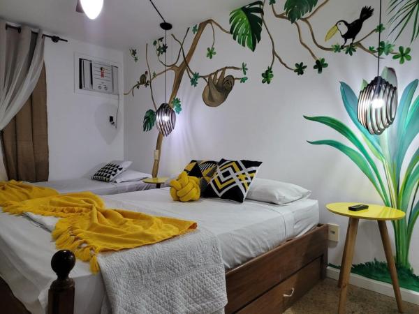 Pousada Costa Del Sol : photo 1 de la chambre chambre triple avec balcon