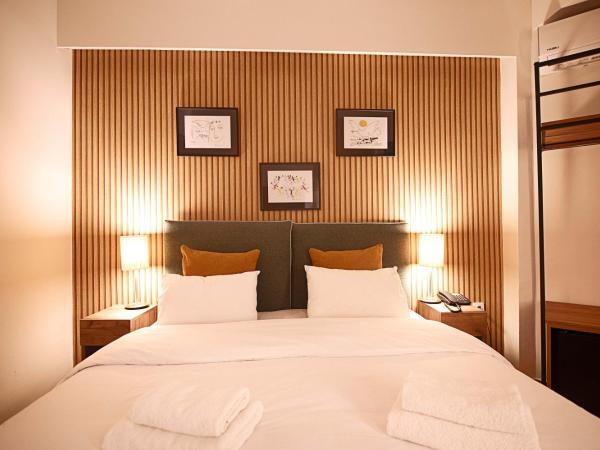 FALIREON HOTEL : photo 5 de la chambre chambre familiale - vue latérale sur mer