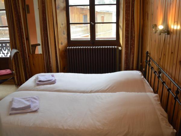 Hotel Le Genepy : photo 8 de la chambre chambre lits jumeaux spacieuse