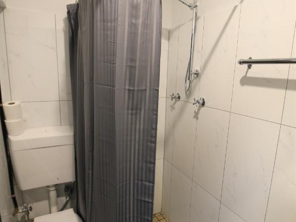 Newtown Cozy Stays : photo 5 de la chambre chambre lits jumeaux standard avec salle de bains commune