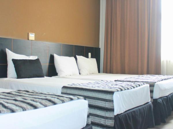 Hotel Atlântico Tower : photo 2 de la chambre chambre quadruple de luxe