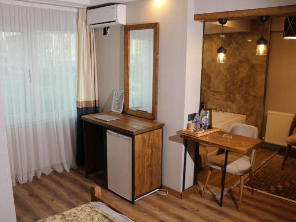 Zengin City Hotel : photo 4 de la chambre suite avec baignoire spa