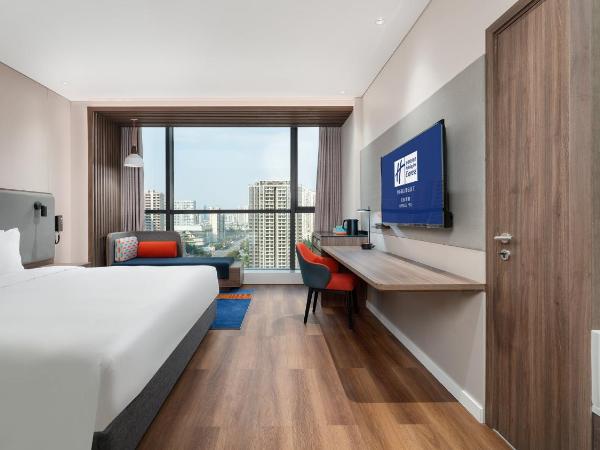 Holiday Inn Express Chengdu Pidu, an IHG Hotel : photo 1 de la chambre hébergement lit king-size standard