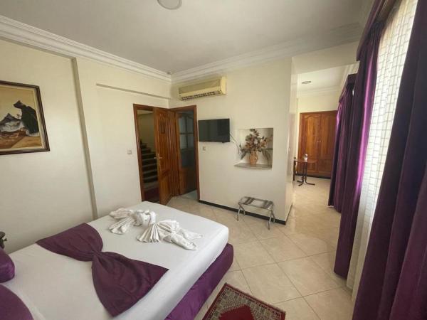 Perla Hôtel : photo 4 de la chambre  chambre double avec 1 grand lit