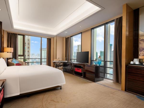 Wanda Vista Dongguan - Free Canton Fair shuttle bus to Canton Fair exhibition center during Canton Fair period : photo 2 de la chambre grande chambre lit king-size