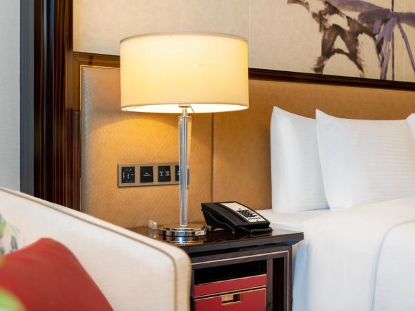 Wanda Vista Dongguan - Free Canton Fair shuttle bus to Canton Fair exhibition center during Canton Fair period : photo 4 de la chambre grande chambre lit king-size