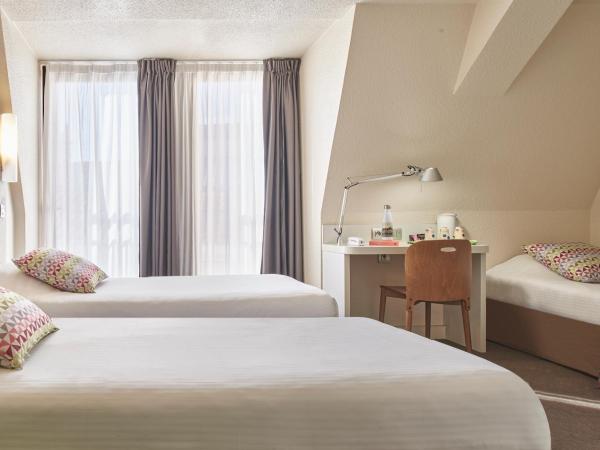 Campanile Lyon Centre - Berges du Rhône : photo 2 de la chambre chambre triple supérieure (2 adultes + 1 enfant)