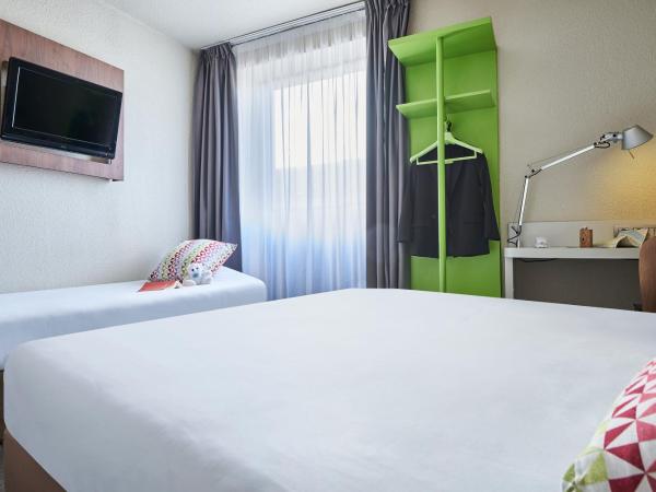 Campanile Lyon Centre - Berges du Rhône : photo 2 de la chambre chambre triple new generation (1 lit double + 1 lit simple)