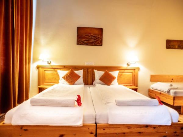 Manzard Panzio : photo 4 de la chambre chambre triple