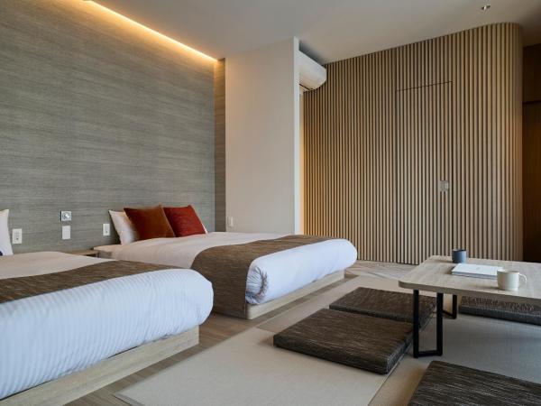 fav HIROSHIMA HEIWAODORI : photo 1 de la chambre chambre quadruple