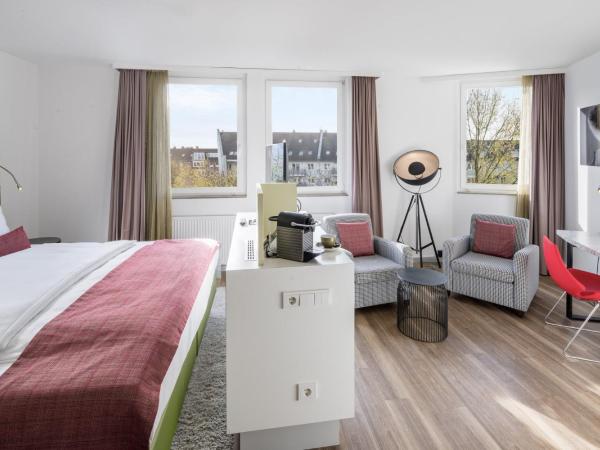 Hotel Indigo - Dusseldorf - Victoriaplatz, an IHG Hotel : photo 4 de la chambre chambre exécutive lit king-size - non-fumeurs