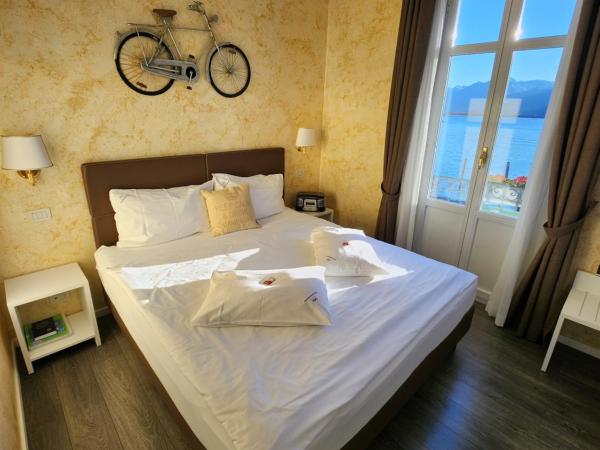 Hotel Millennium : photo 4 de la chambre chambre double supérieure avec balcon et vue sur le lac