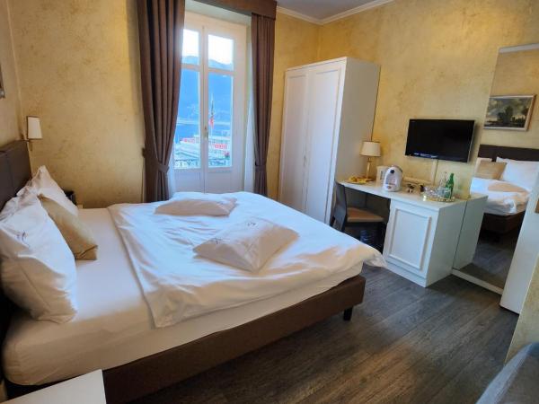 Hotel Millennium : photo 5 de la chambre chambre double supérieure avec balcon et vue sur le lac