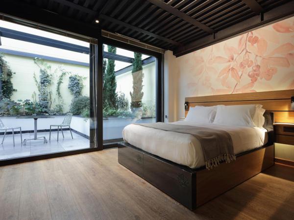 VERSOVERDE HOTEL Alzaia Naviglio Grande : photo 2 de la chambre chambre double ou lits jumeaux supérieure - vue sur jardin
