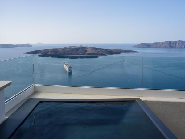Nefeles Luxury Suites : photo 4 de la chambre suite junior avec jacuzzi - vue sur coucher de soleil