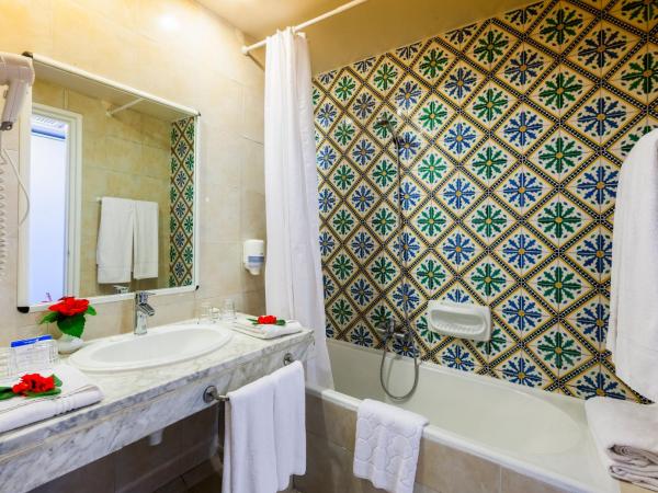 Splash World Venus Beach : photo 4 de la chambre chambre quadruple - vue sur jardin