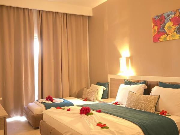 Splash World Venus Beach : photo 5 de la chambre chambre double - vue sur jardin