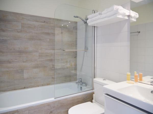 La Résidence Arles Centre : photo 8 de la chambre appartement de luxe au 2ème Étage - vue sur cour