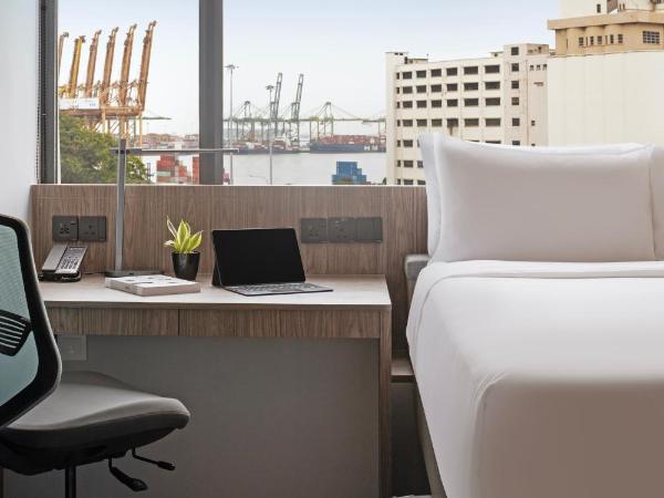 Travelodge Harbourfront Singapore : photo 3 de la chambre chambre lit queen-size deluxe