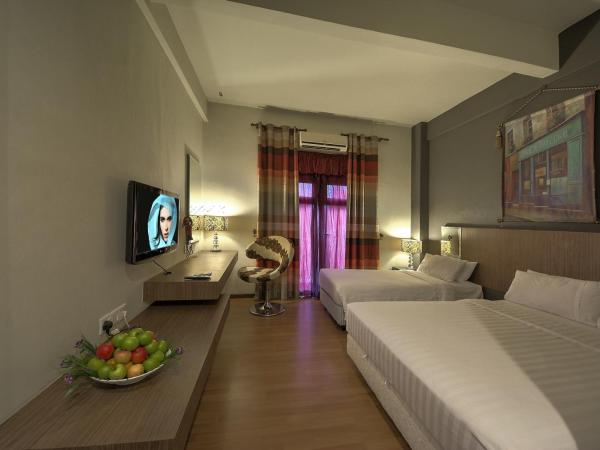 Arenaa Deluxe Hotel : photo 2 de la chambre chambre quadruple premier