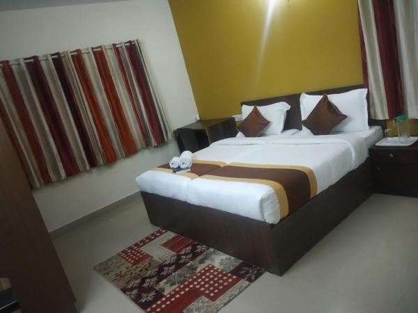 Bulande Comforts-Service Apartment In Brookfield : photo 3 de la chambre chambre double deluxe