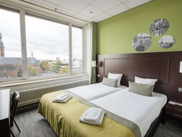 Flonk Hotel Groningen Centre, BW Signature Collection : photo 1 de la chambre chambre lits jumeaux standard