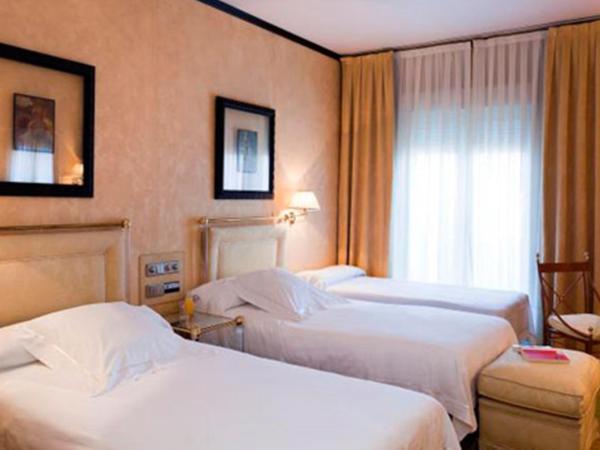 Hotel Santo Domingo : photo 5 de la chambre chambre double ou lits jumeaux avec lit d'appoint