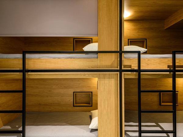 Mosaikon Glostel : photo 1 de la chambre lit simple dans dortoir pour femmes de 4 lits