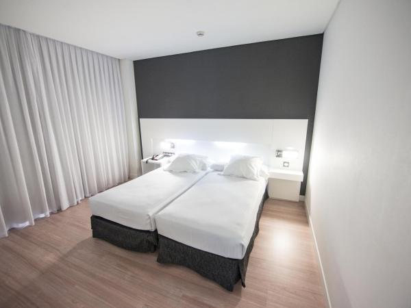 Axor Feria : photo 8 de la chambre chambre double avec navette aéroport gratuite