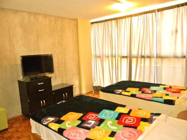 B&B México Roma Norte : photo 7 de la chambre chambre lits jumeaux club avec salle de bains commune