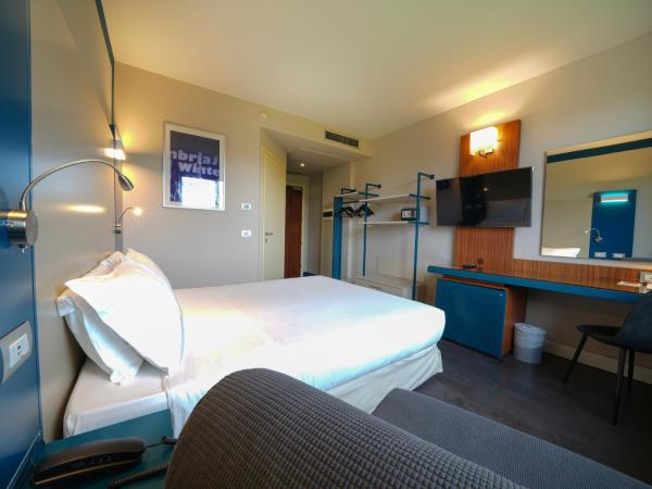 La Meridiana Bleisure Hotel : photo 3 de la chambre chambre triple supérieure