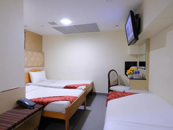 Sandpiper Hotel Singapore : photo 1 de la chambre chambre familiale - sans fenêtre