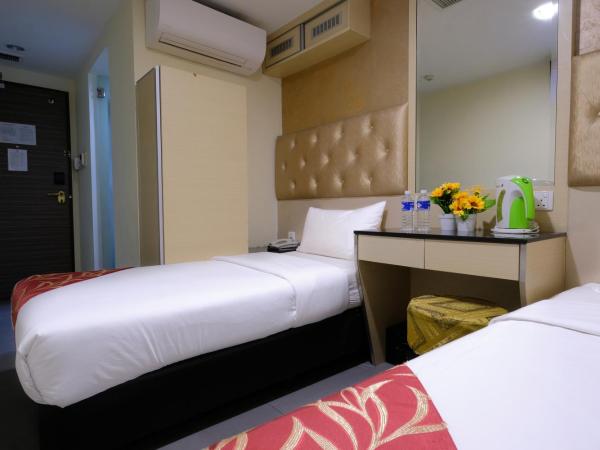 Sandpiper Hotel Singapore : photo 1 de la chambre chambre lits jumeaux supérieure - sans fenêtre