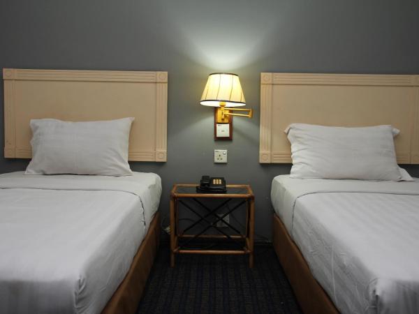 Sandakan Inn : photo 6 de la chambre chambre lits jumeaux deluxe