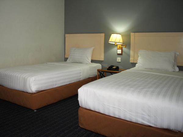 Sandakan Inn : photo 5 de la chambre chambre lits jumeaux deluxe